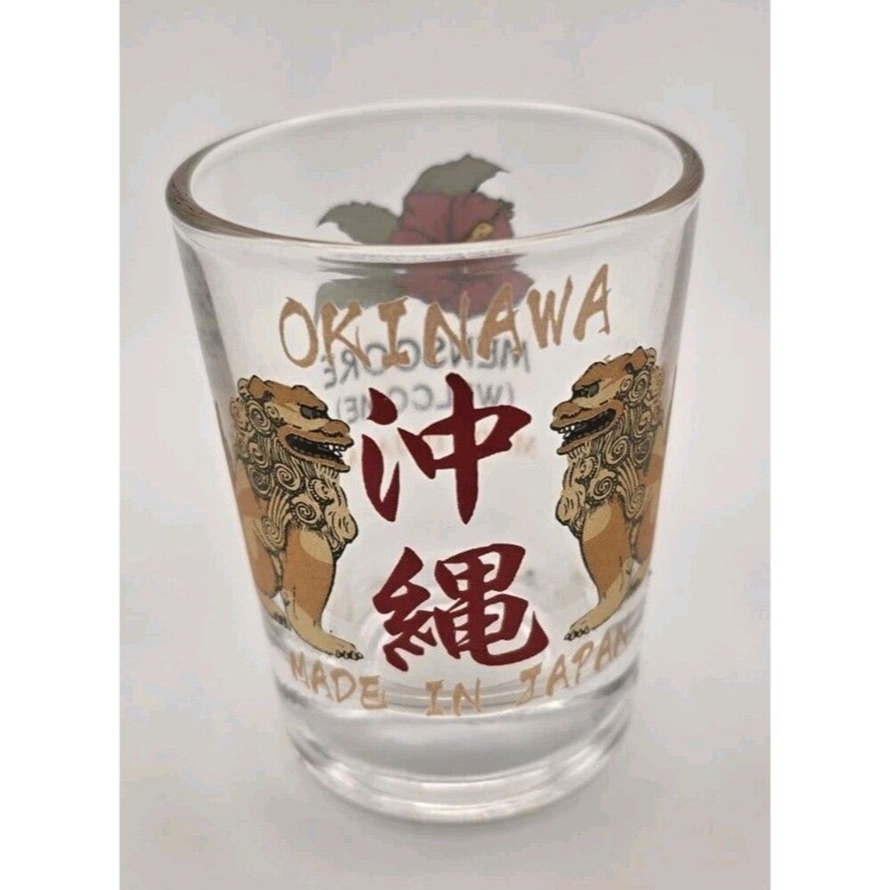 Okinawa Japan Souvenir Shot Glass Shisa Lions Hibiscus Flower "Mensoore" Welcome